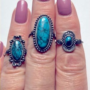 Lot of 3 Sterling Silver and turquoise adjustable rings.